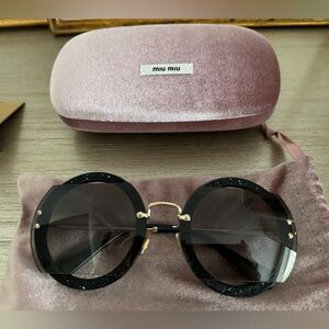 Miu Miu black round sunglasses